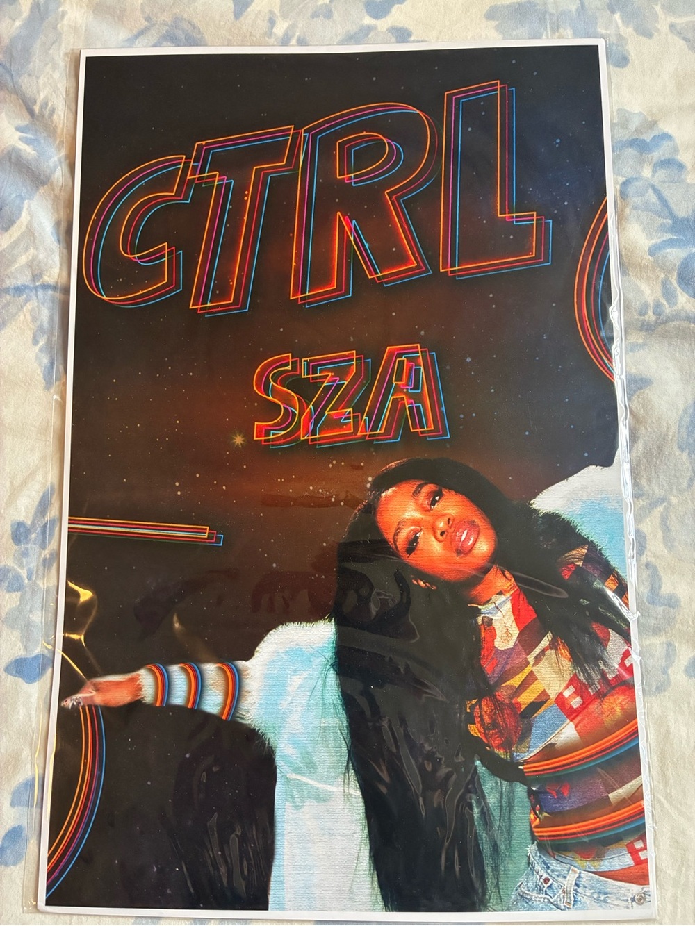SZA Album Poster with Rainbow Neon Text and Portrait